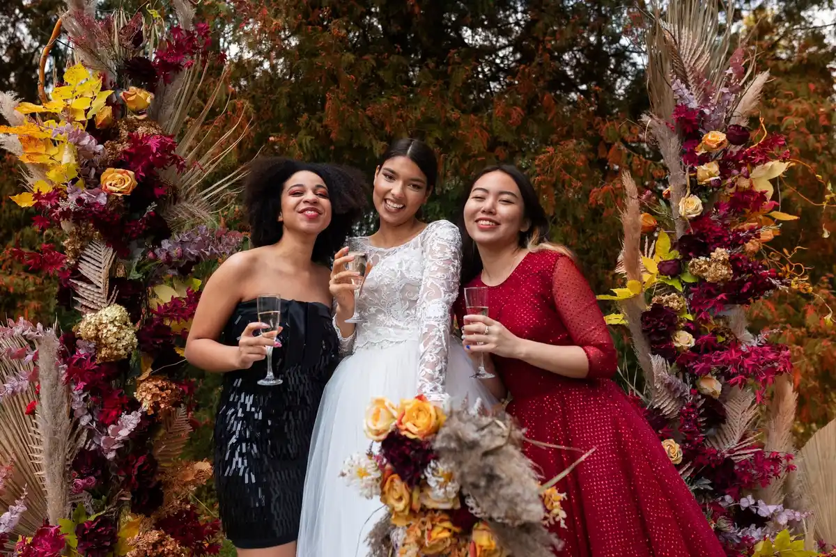 guests wearing gold and pastel colors at chinese wedding