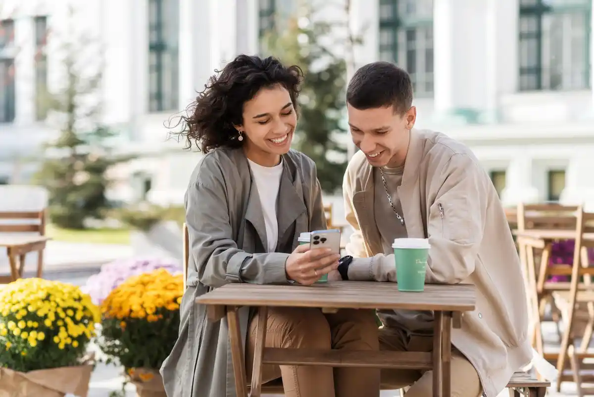parisian couple first date conversation cafe terrace