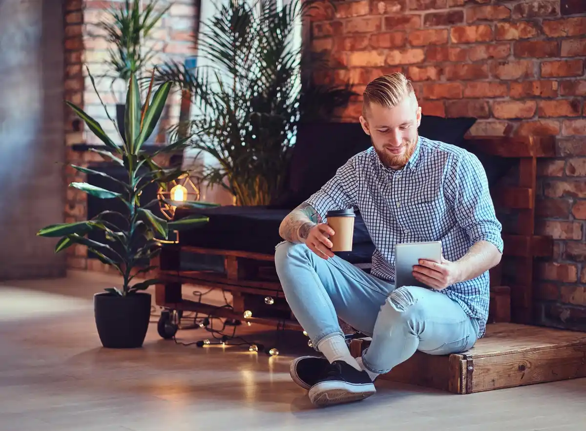 dutch man reading a book by the window, old-fashioned home atmosphere, calm