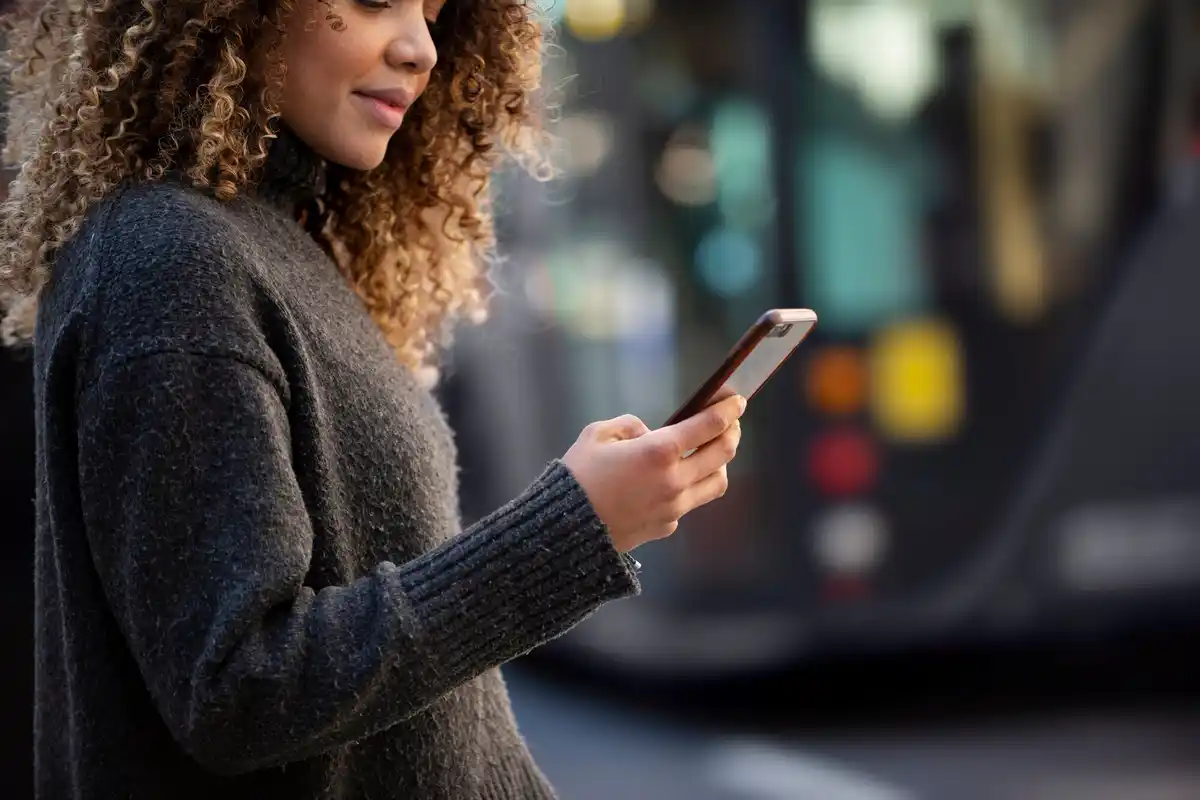 dutch commuters using smartphones in public transport