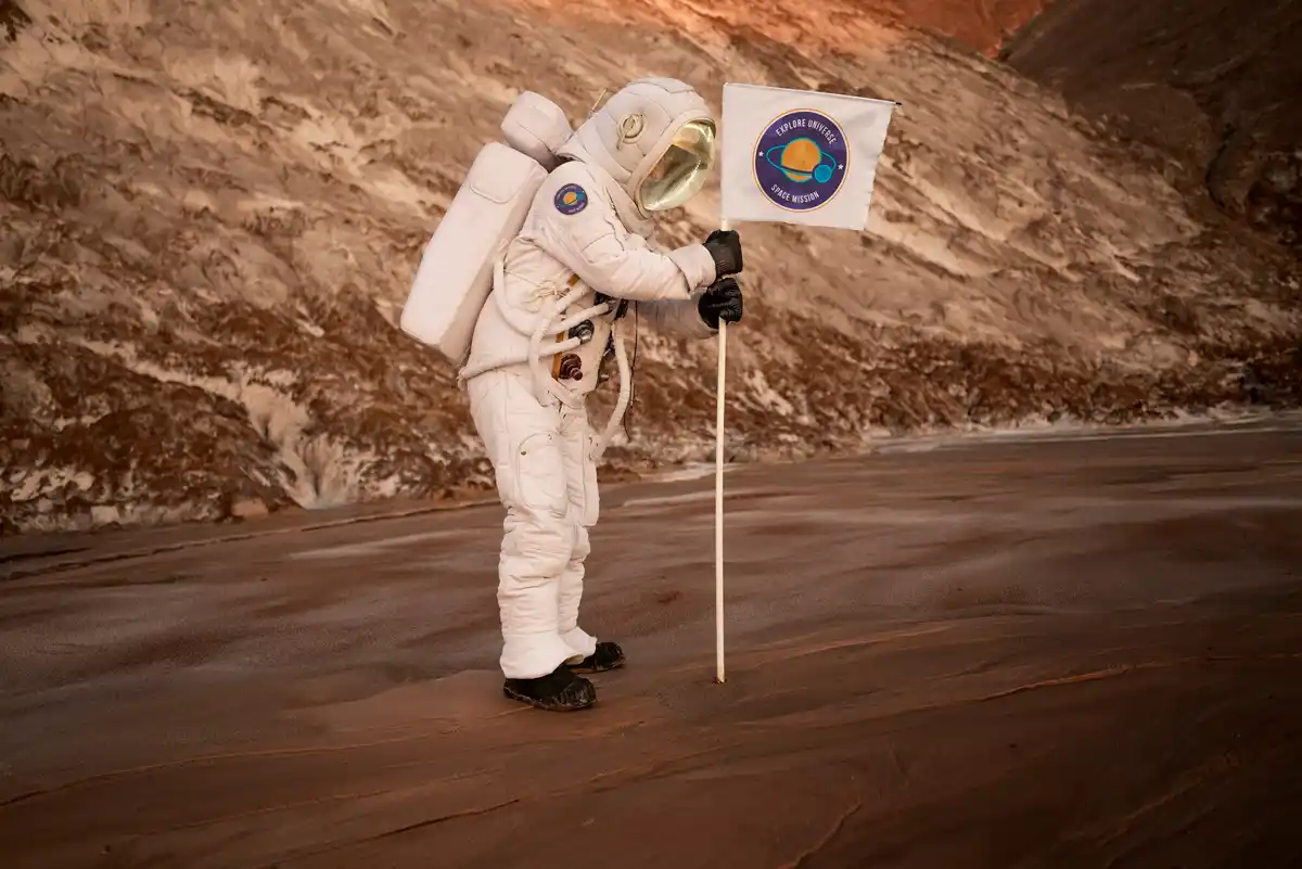 astronaut looking at floating debris from window