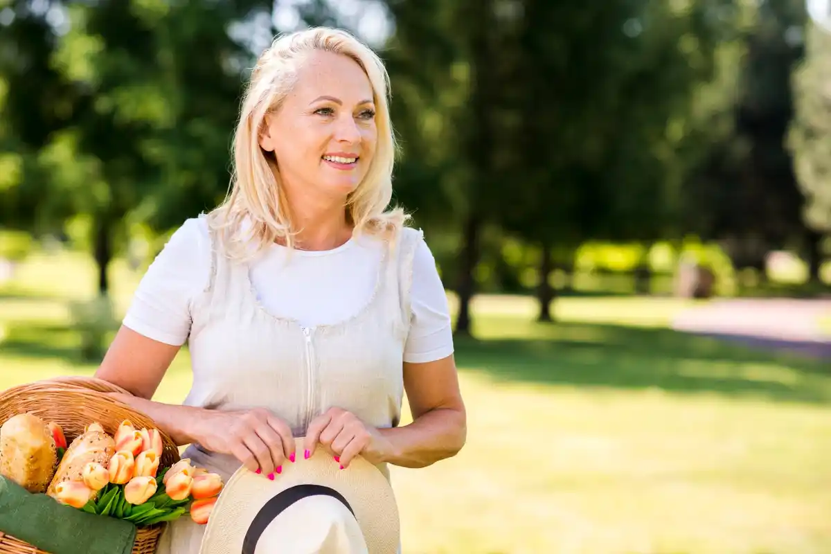 middle aged Dutch woman smiling spring park