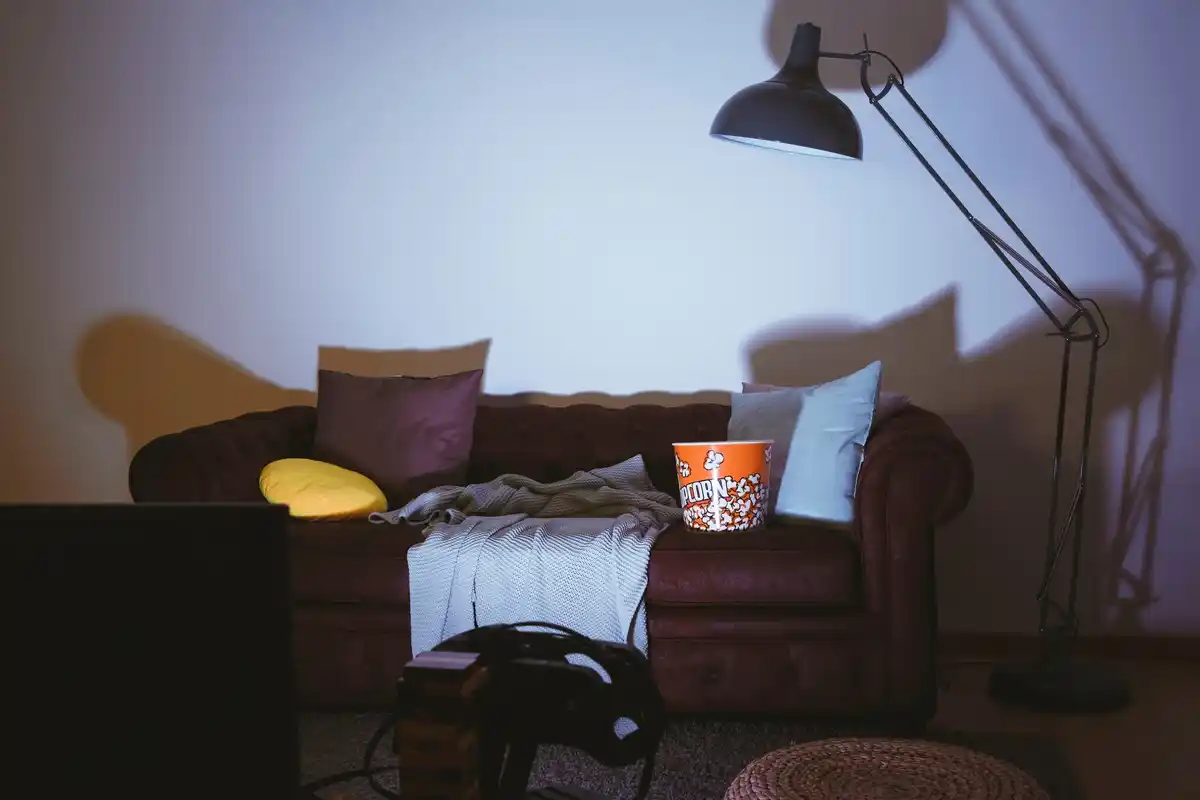 Dutch bedroom with glowing LED gadget at night