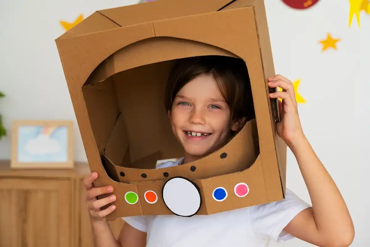 child DIY space helmet experiment at home