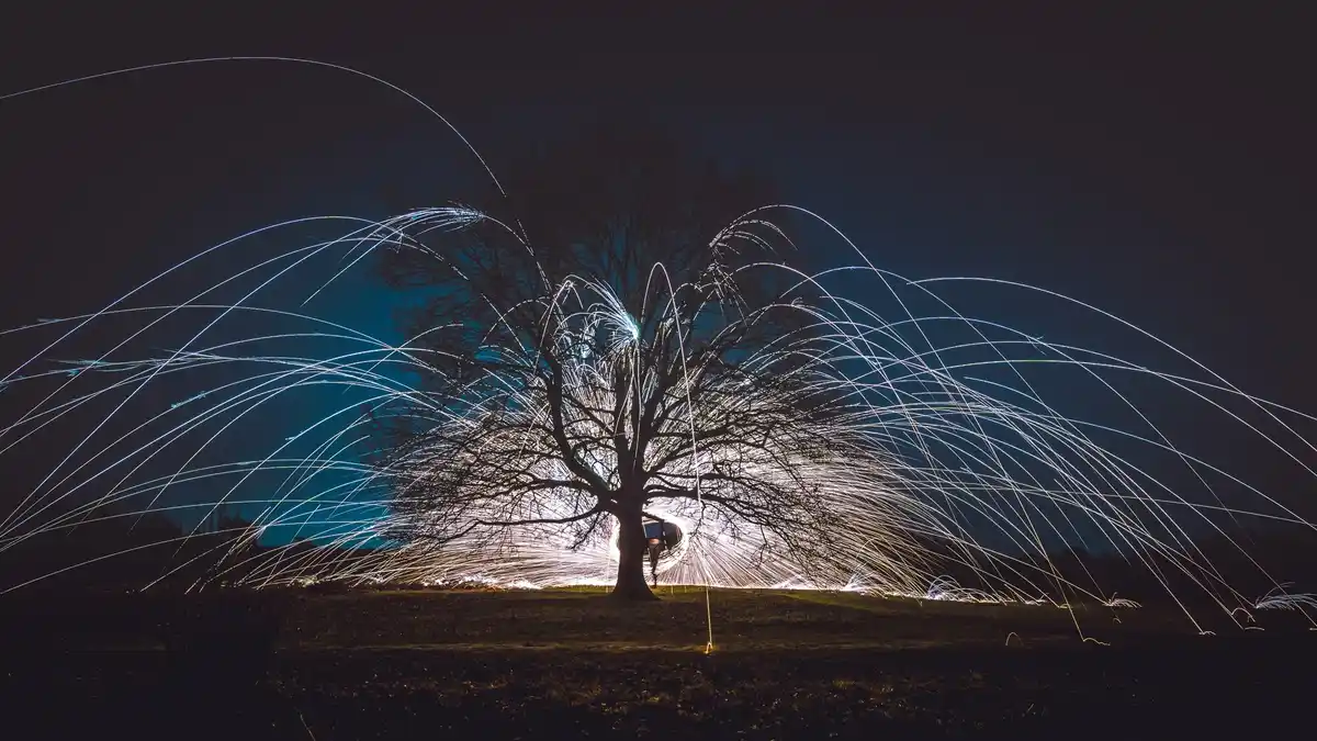 Night sky over Dutch suburban garden with strange glowing object