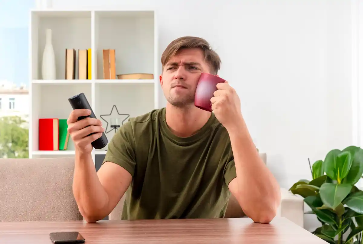 stressed person turning off phone in Dutch home