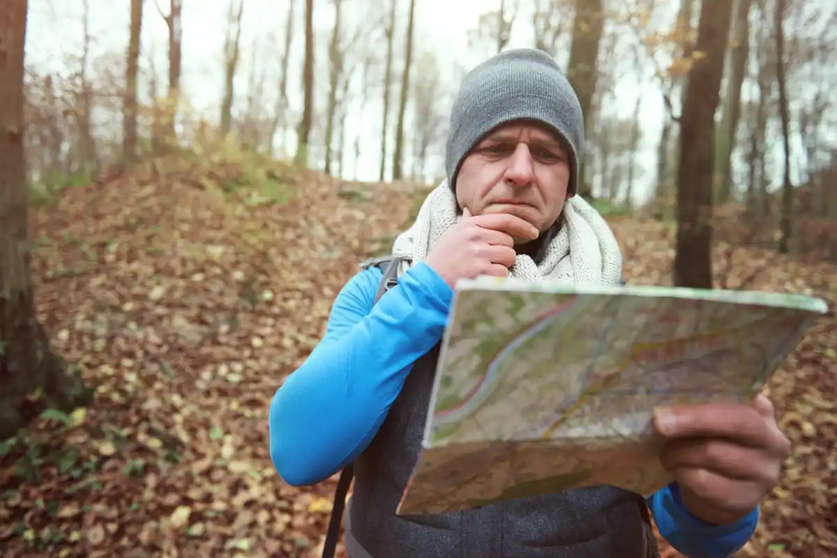 Dutch treasure hunter searching old map