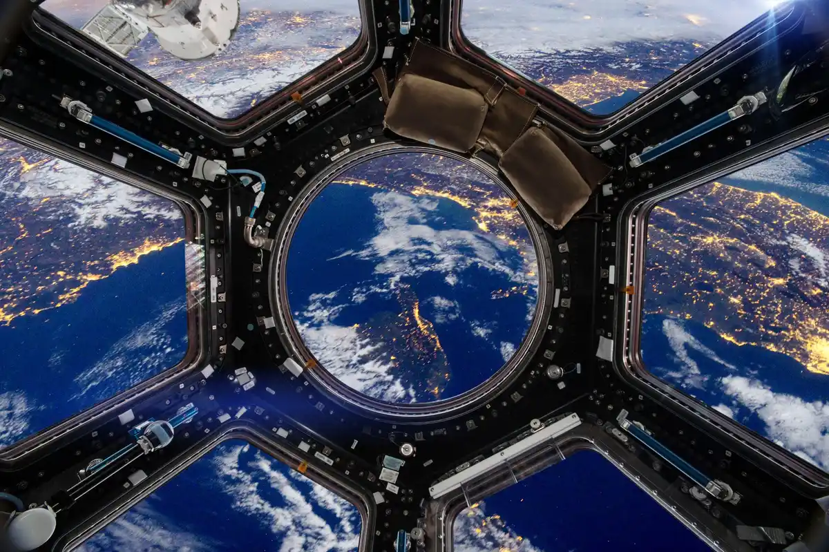 asteroid passing close to earth satellite view