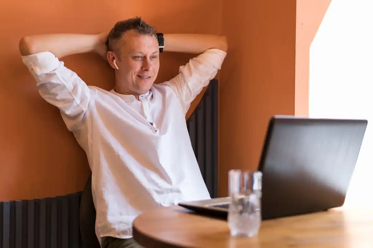 Dutch adult stretching neck and shoulders in modern office