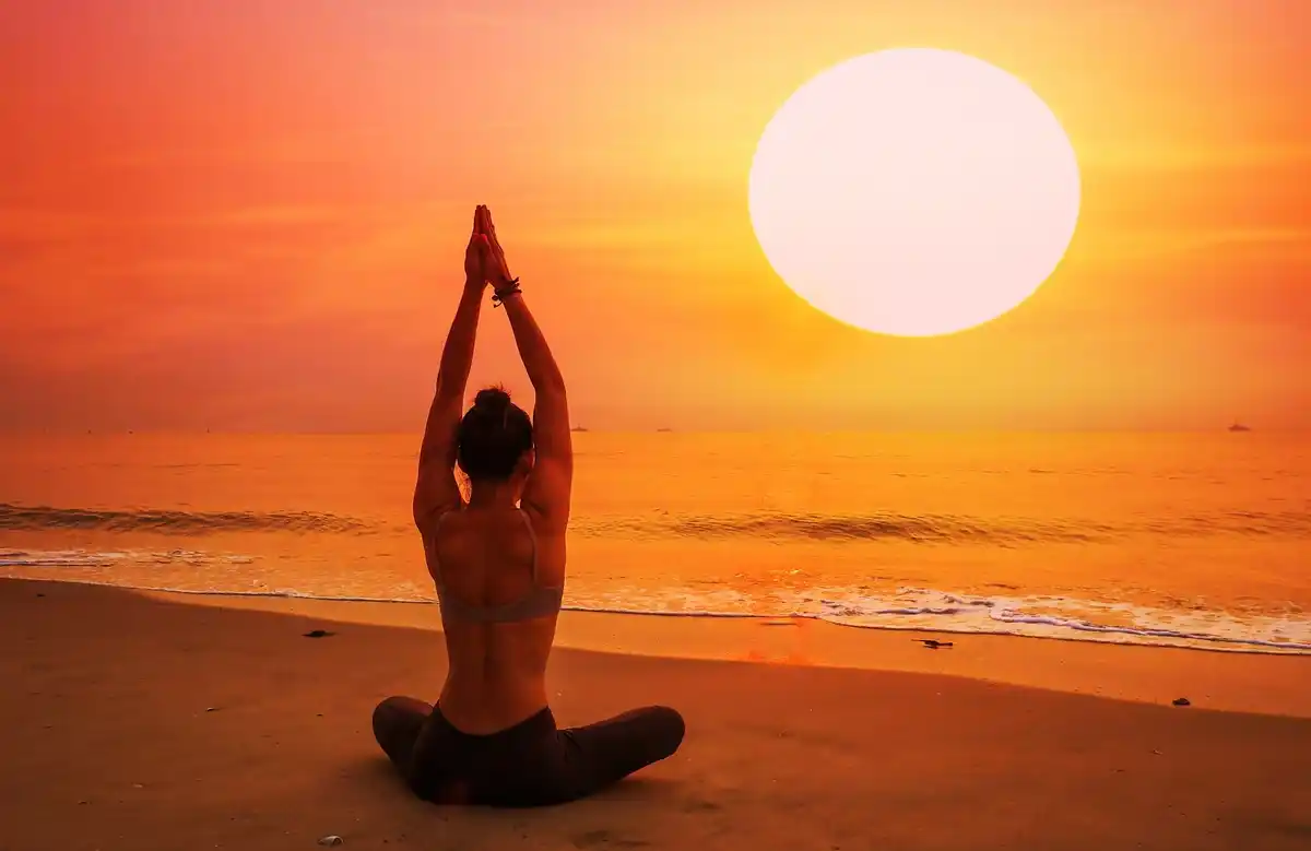 sunrise yoga pink sand Espiguette beach