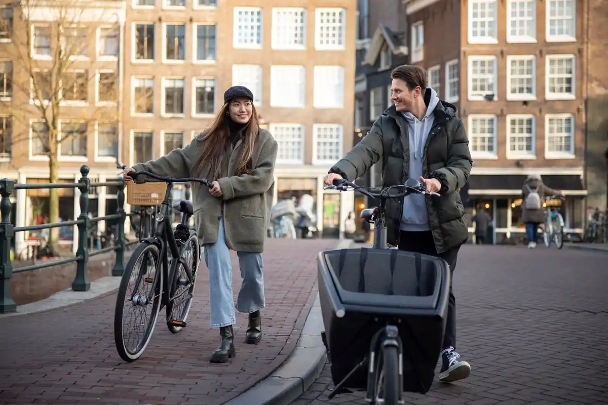 cycling through amsterdam on monday morning