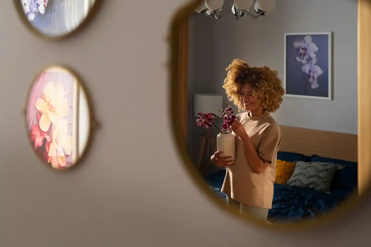 woman looking away from mirror, self-reflection challenge, Dutch home interior
