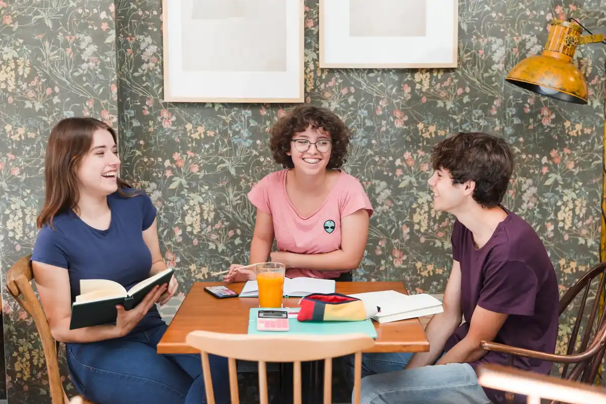 young people discussing human design in cafe netherlands