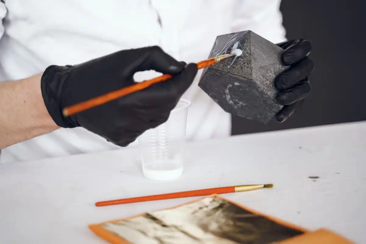 archeologist hand drawing excavation trench
