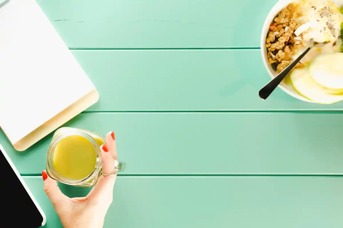 Dutch office desk with healthy and unhealthy snacks, top view, vibrant colors