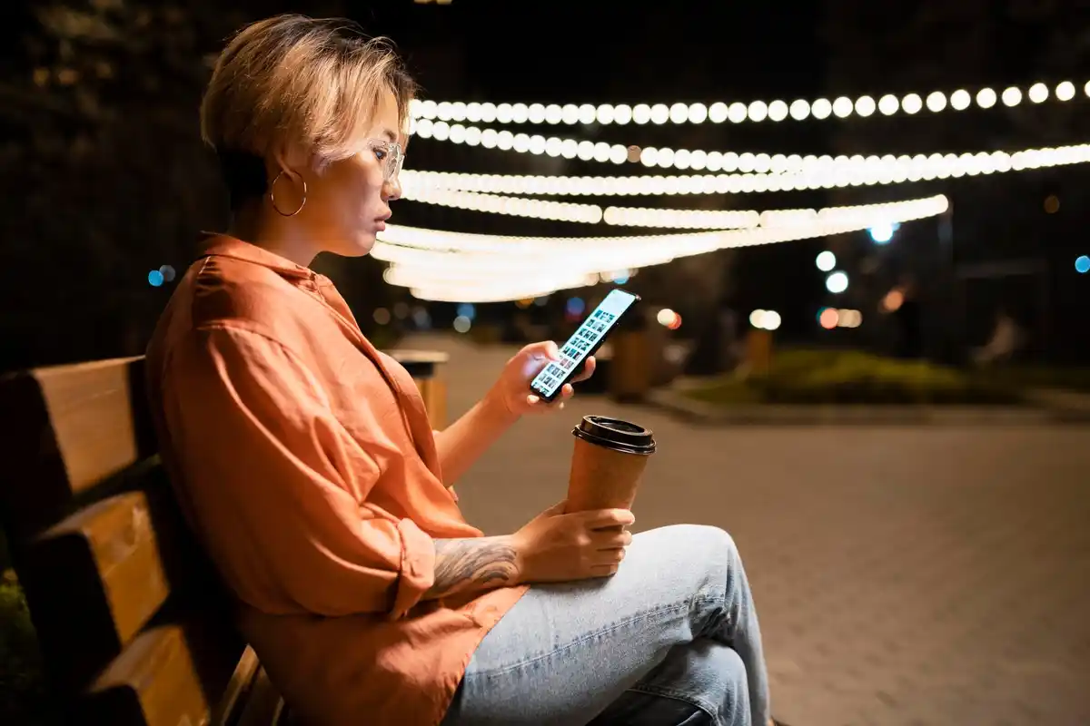 Dutch stargazing with smartphone in city night