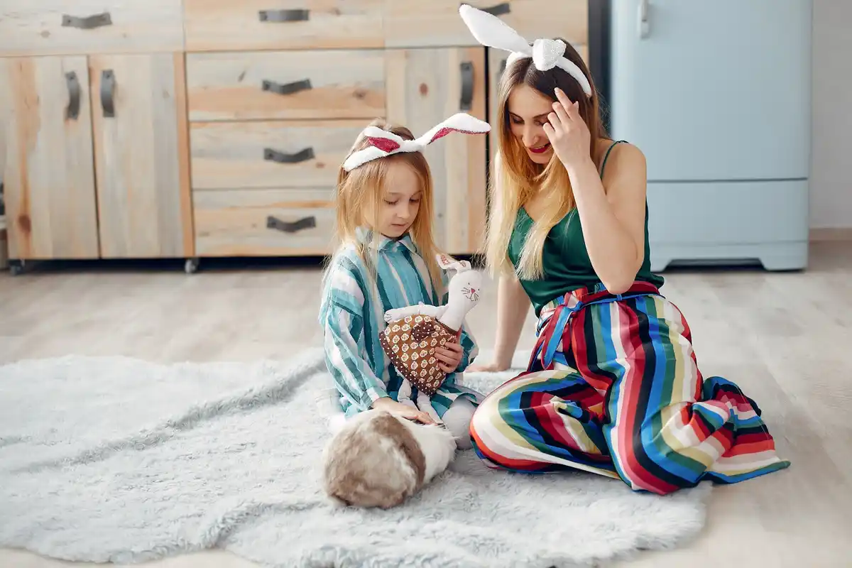 family with guinea pig in cozy living room Netherlands