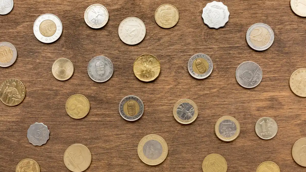 vintage dutch coins on wooden table realistic