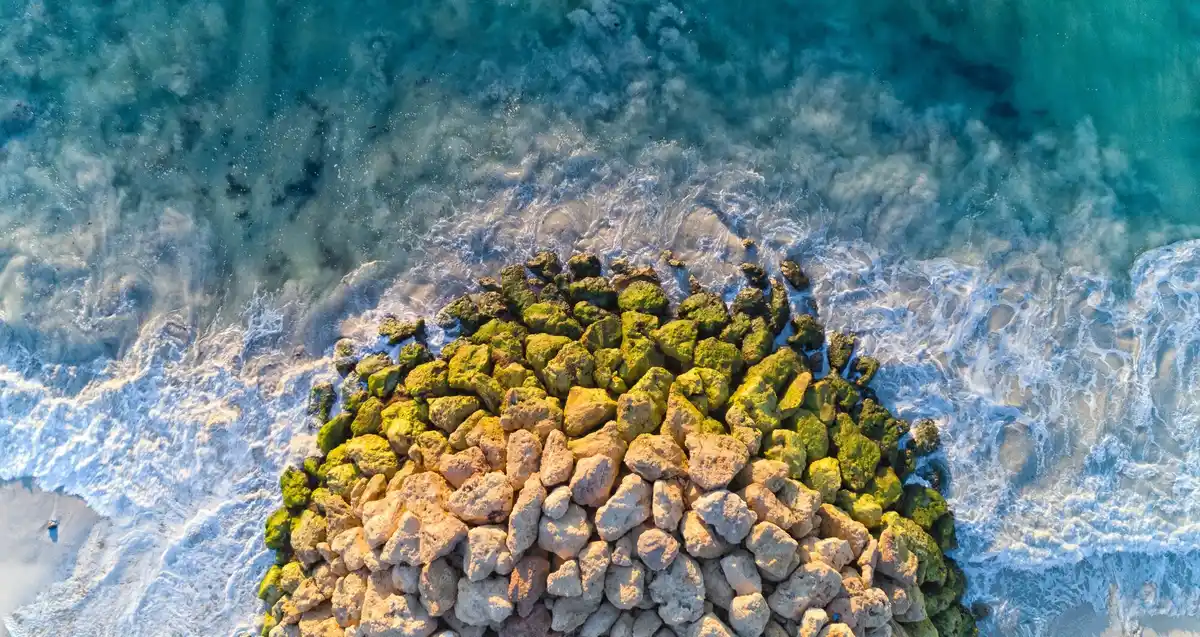 floating pumice raft in ocean aerial view