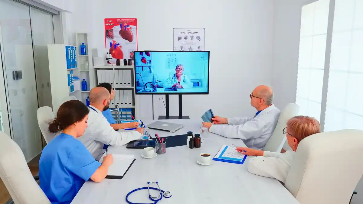 doctor watching robotic surgery in hospital Netherlands