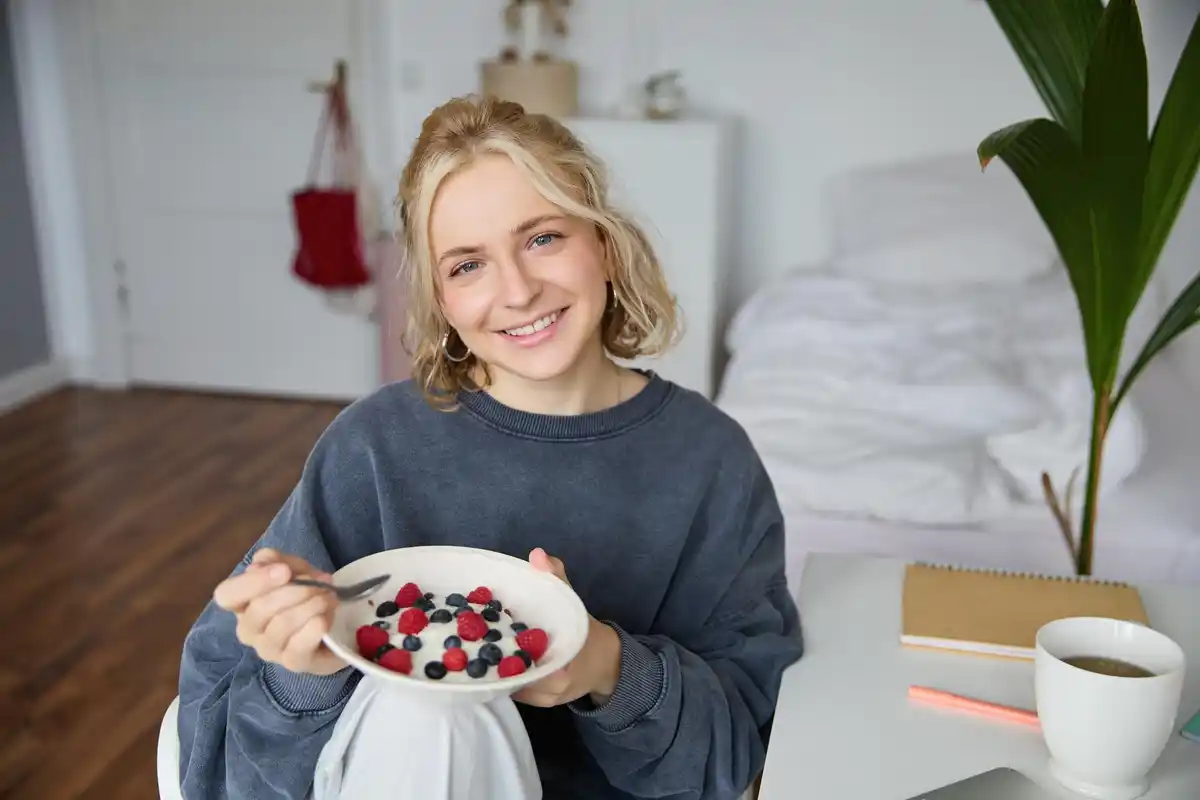 Dutch person trying exotic jabuticaba fruit at home