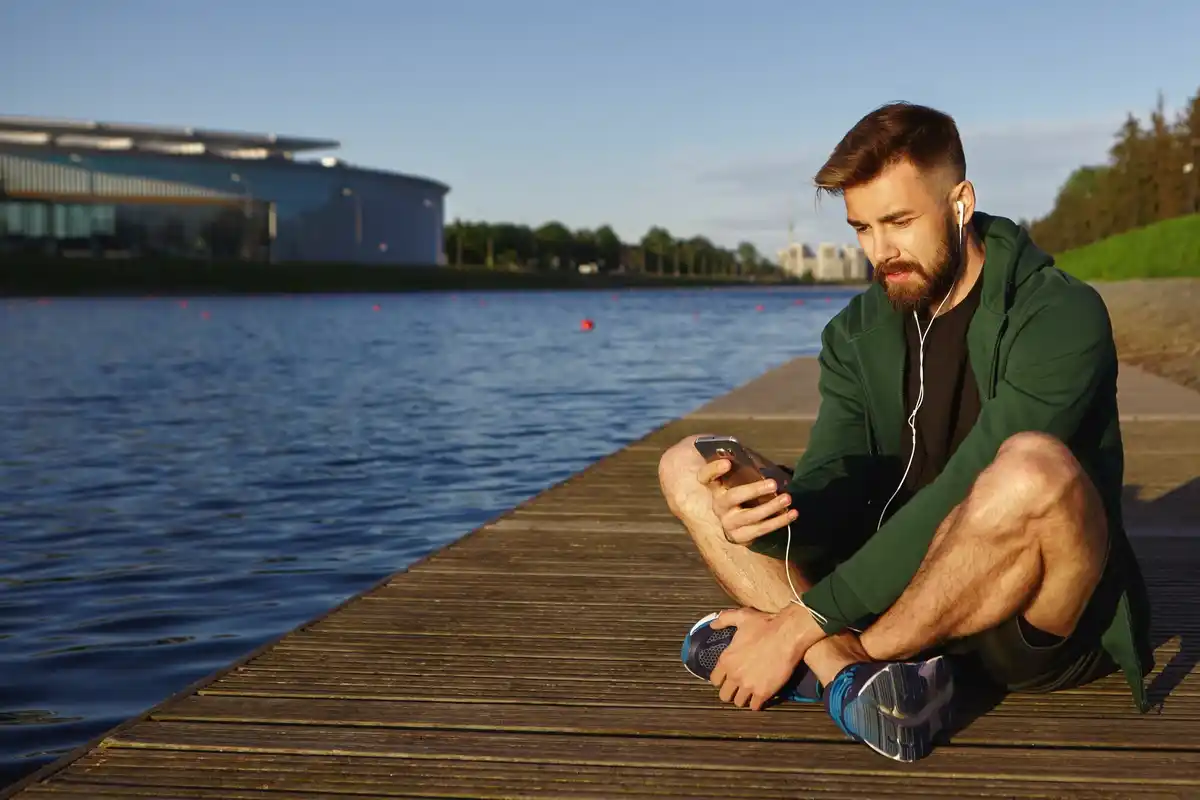 Dutch person using smartphone hidden feature outdoors