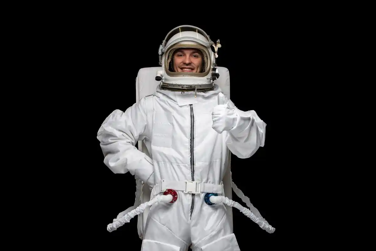 smiling elderly man astronaut suit space background