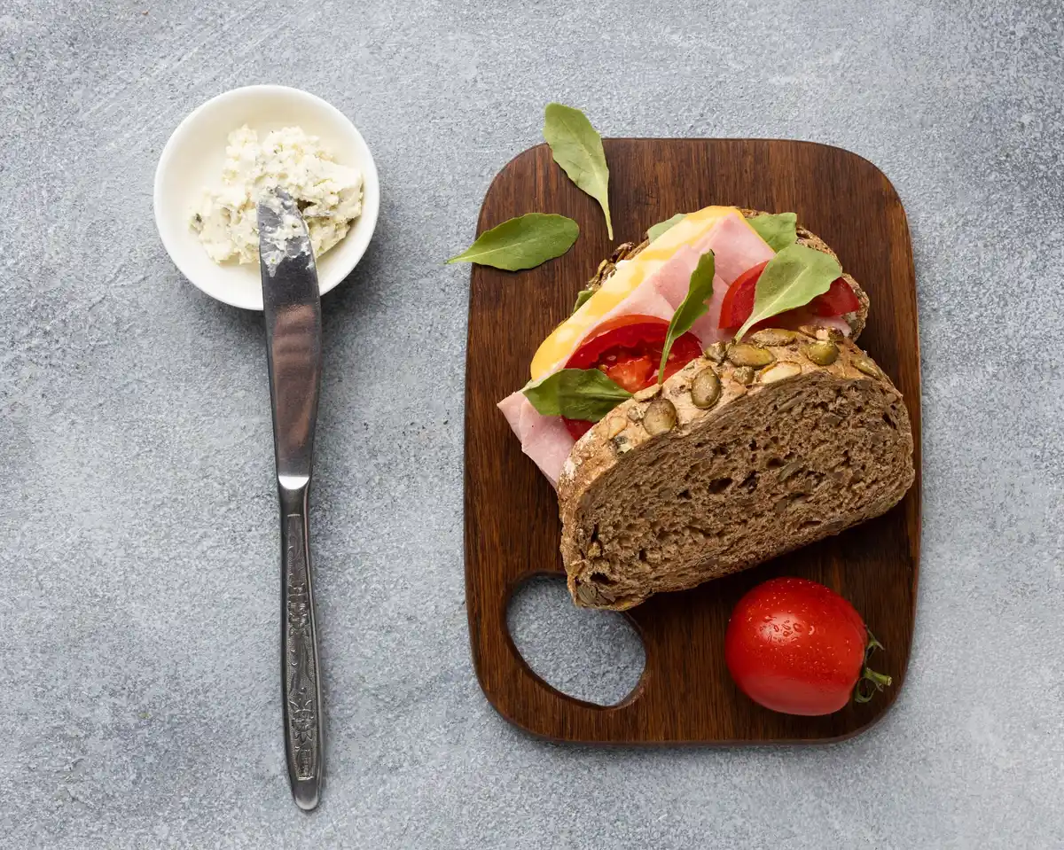 Traditional Dutch lunch sandwich with cheese on desk