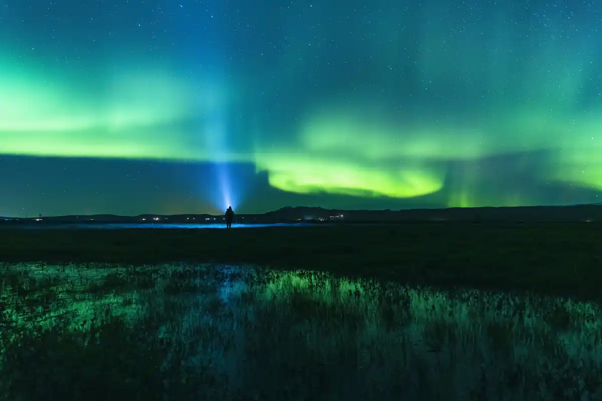 full moon over Netherlands night sky aurora