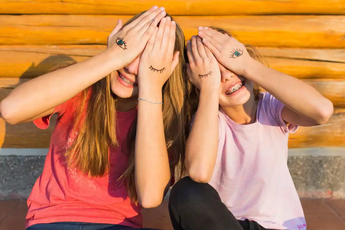 women openly crying together friendship emotions Netherlands