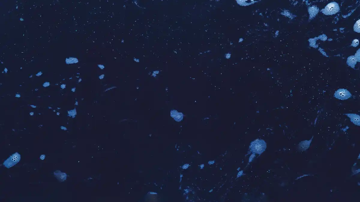 cosmic dust particles floating in space close-up