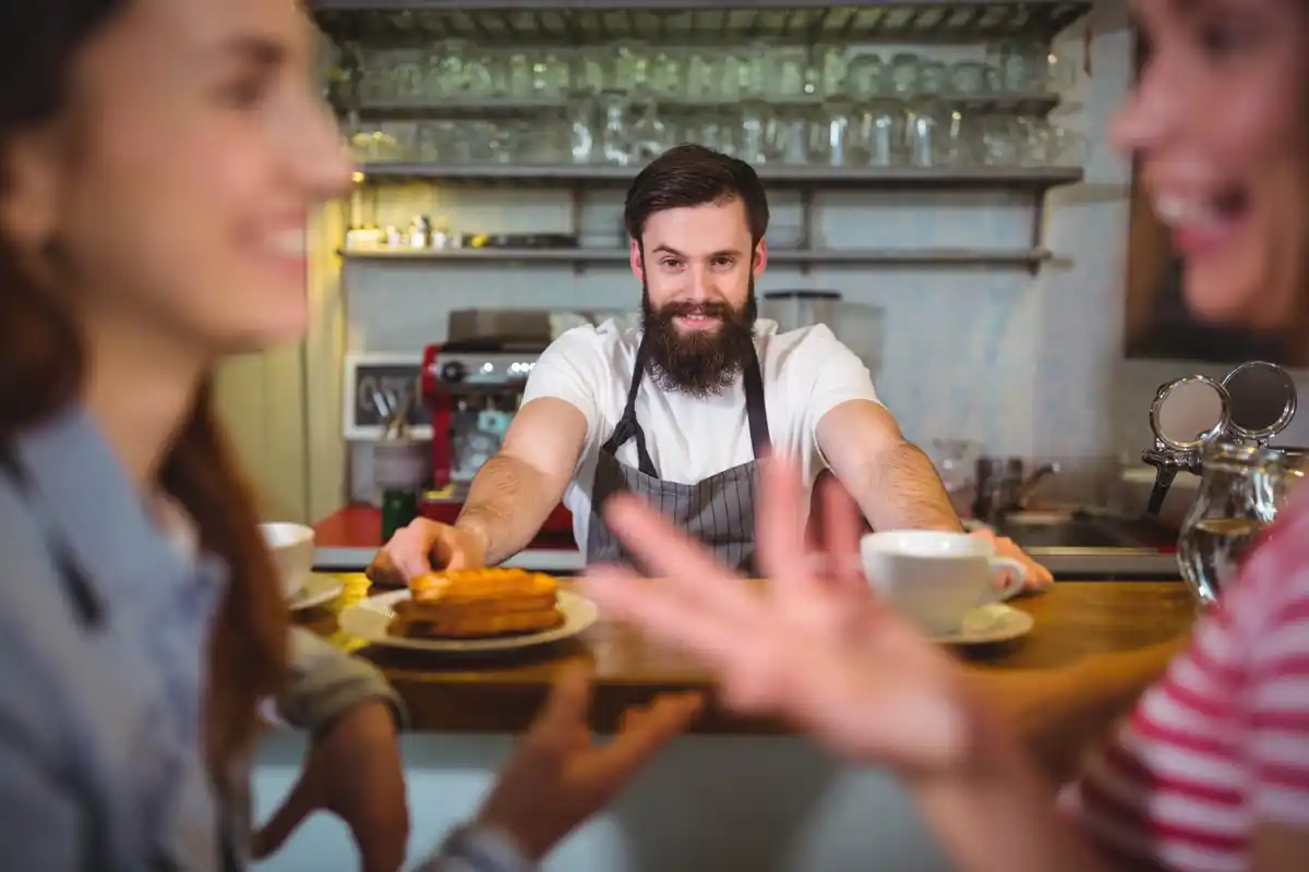 Confused French waiter with Dutch guests trying to split the bill