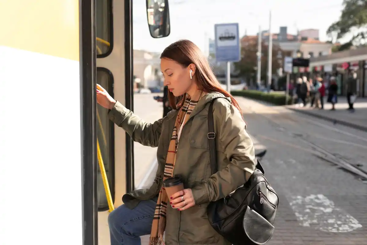 Dutch tram passing, person ignoring it, Amsterdam street scene