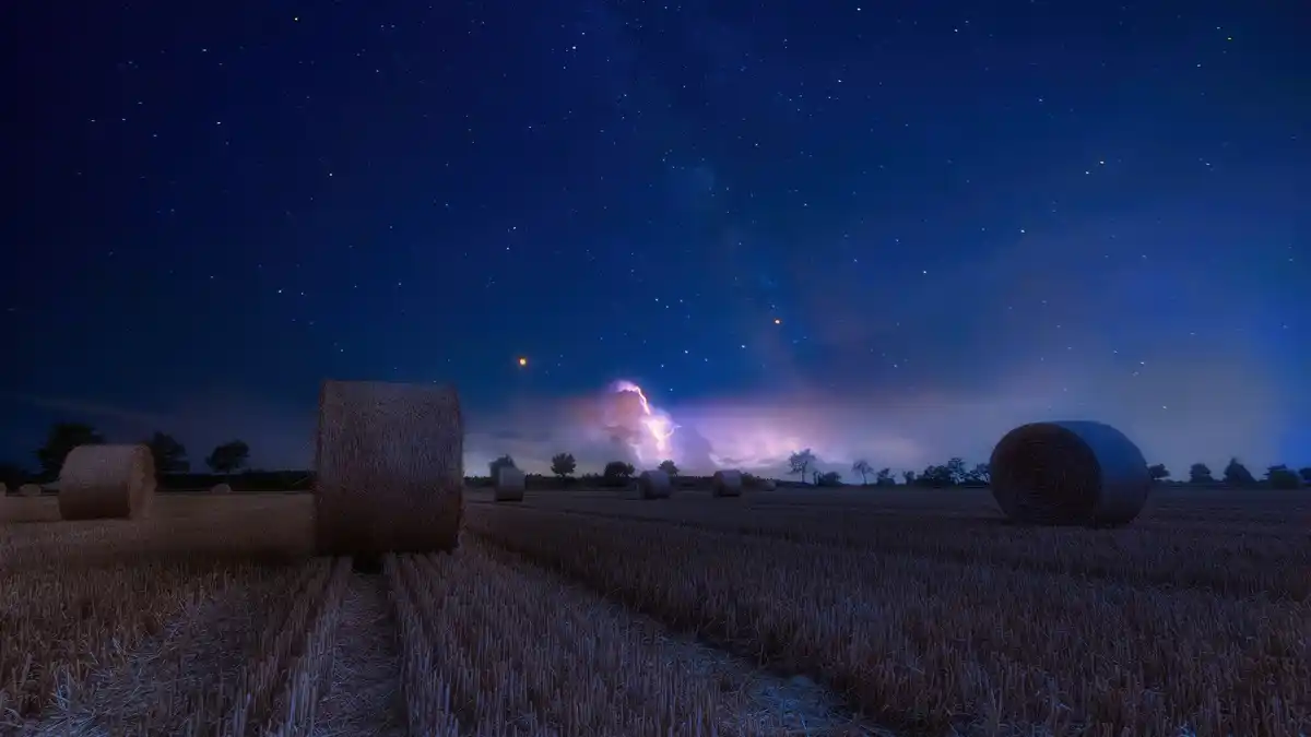 starry night sky over Netherlands field