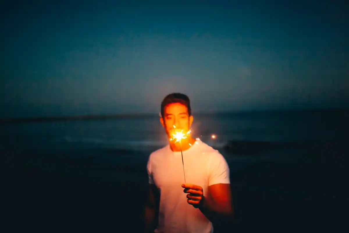 Dutch person looking at stars red flashlight