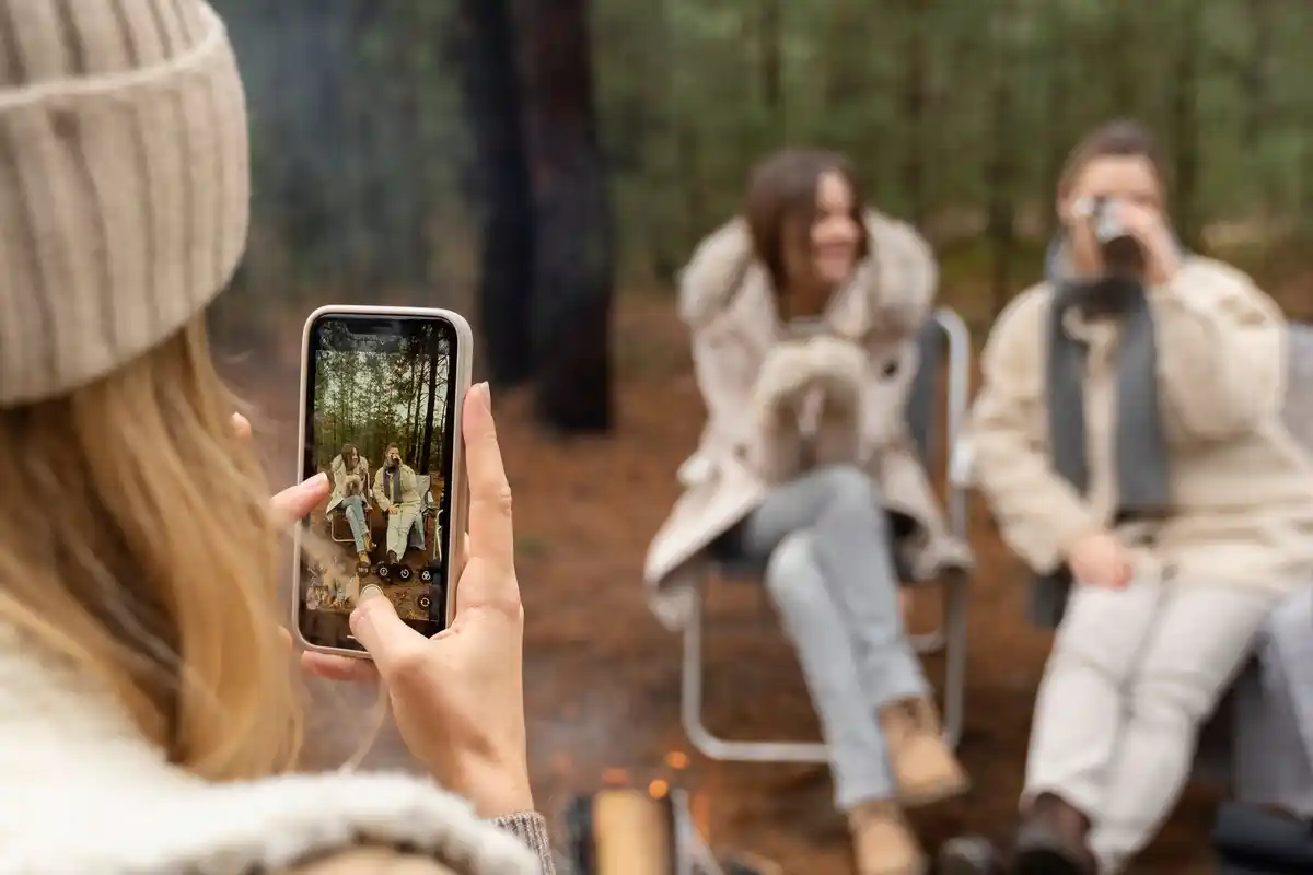 family using old smartphones for stargazing in dutch backyard