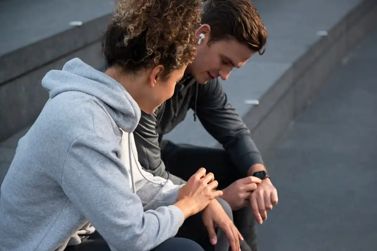Dutch person checking smartwatch heart rate in daily city life