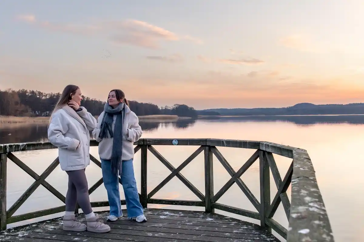 finland people greeting in nature lake