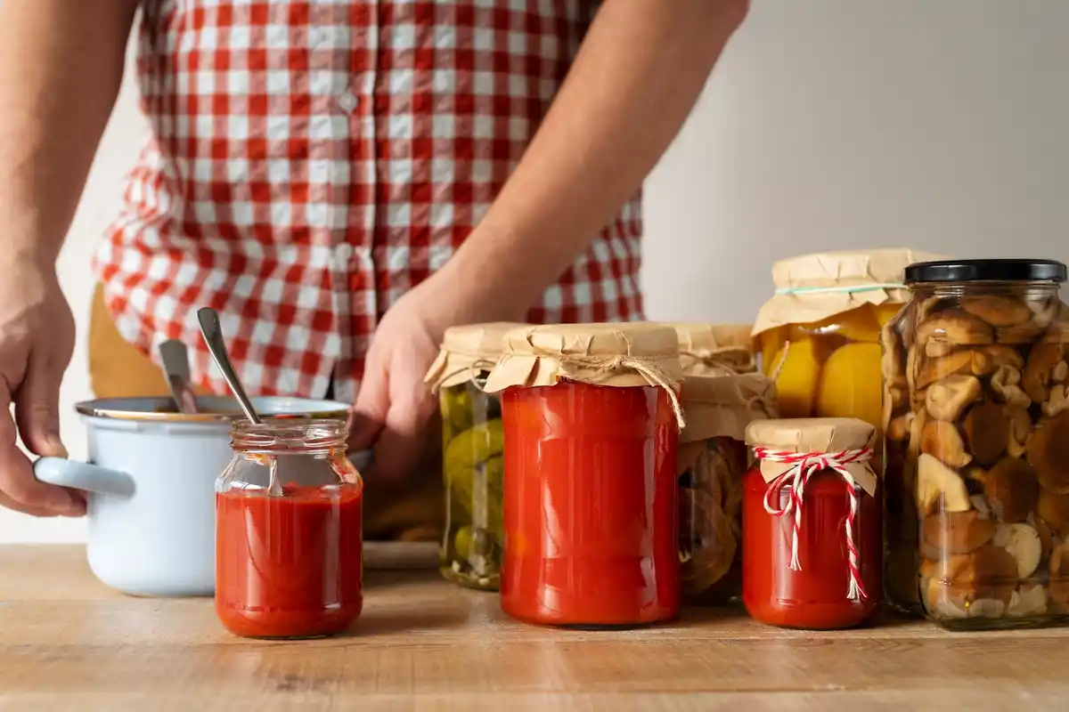 Traditional Dutch pantry with preserved foods and glass jars